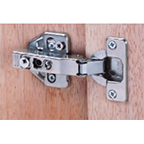 How does this hinge compare to the BLUM 73B3580? Which hinge plate works with the WE hinge; on a frameless cabinet.