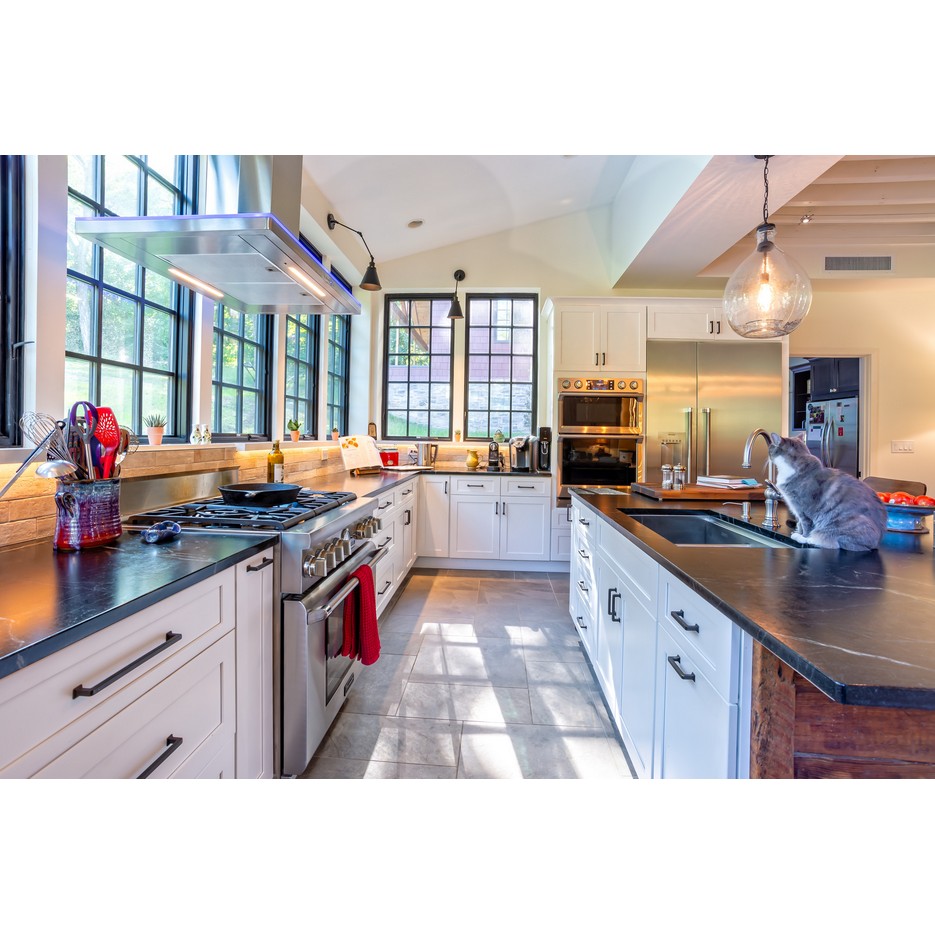 A beautiful kitchen with black granite countertops Re craft your kitchen to be the heart of your home