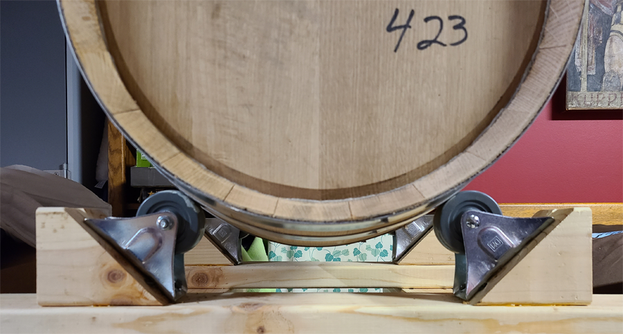 Side view of barrel sitting on casters