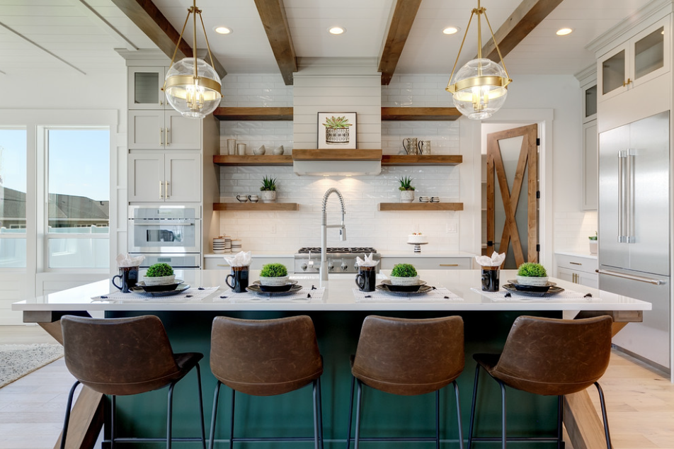 A modern farmhouse kitchen using wood accents and contemporary hardware