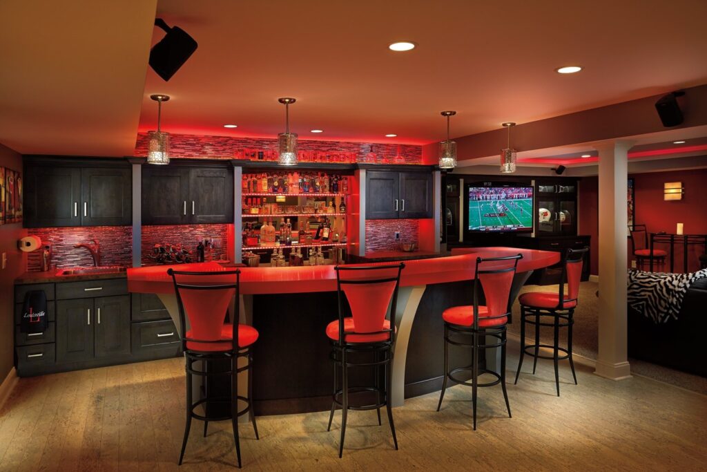 A red themed Family man cave designed to appeal to both adults and children