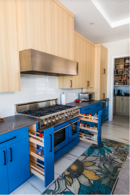 Bold blue cabinets create a big design statement but the organizers tell the real story