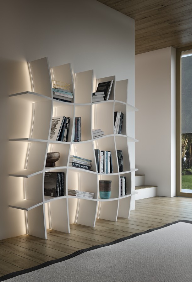 Lifestyle Silicone0101 Woodworker Express Blog Modern curved white bookshelf with built in backlighting on a white wall in a bright room filled with books and decor