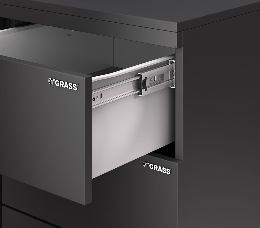 Dark grey kitchen cabinet with an open drawer showing metal sliding rails and the GGRASS logo on the front panels