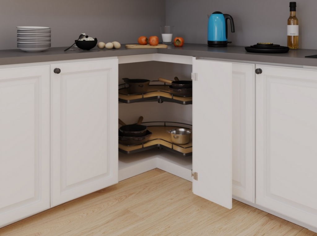 Open corner kitchen cabinet revealing three rotating shelves with pots and pans inside