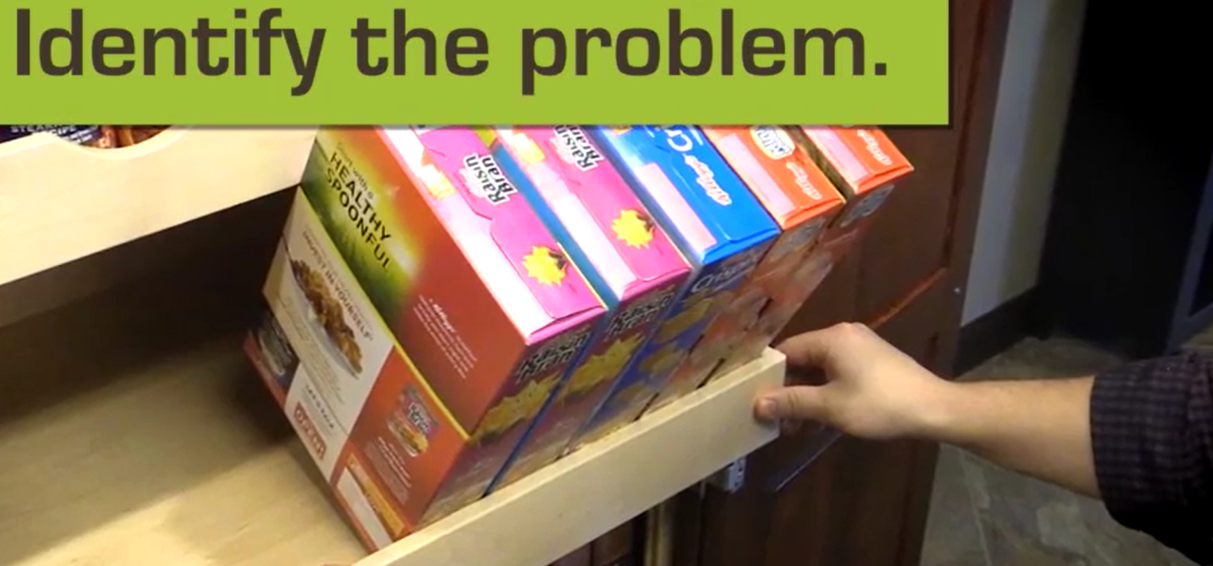 XSeriesBracketCommonMistakes Woodworker Express Blog A persons hand slides out a drawer of colorful cereal boxes from a wooden cabinet