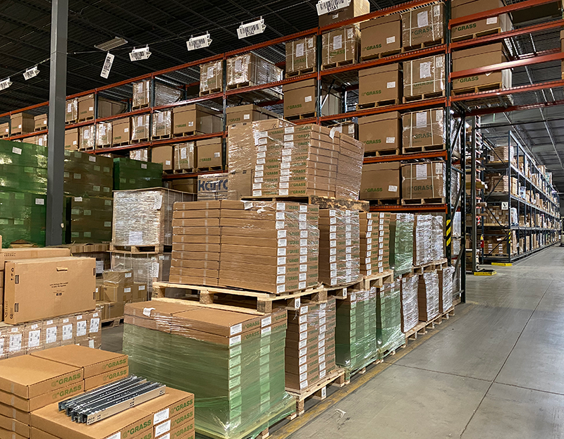 Photo of warehouse showing abundance of Grass products - image link opens in new window